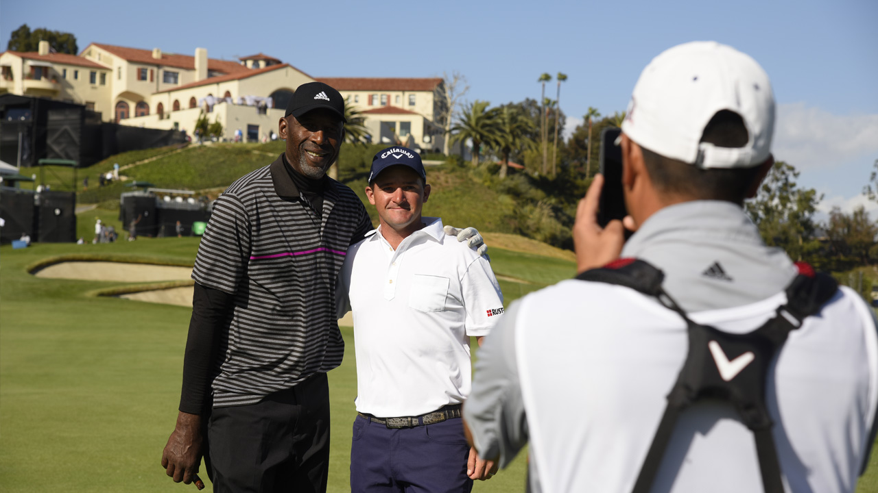 James Worthy and Sam Saunders pose for a photo