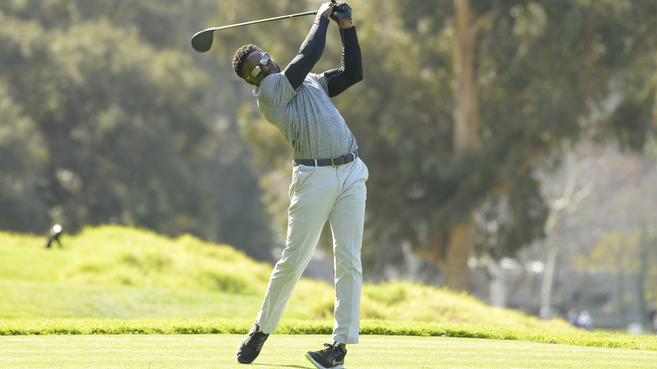 Reggie Bush golfing in the Official Genesis Open Pro-Am
