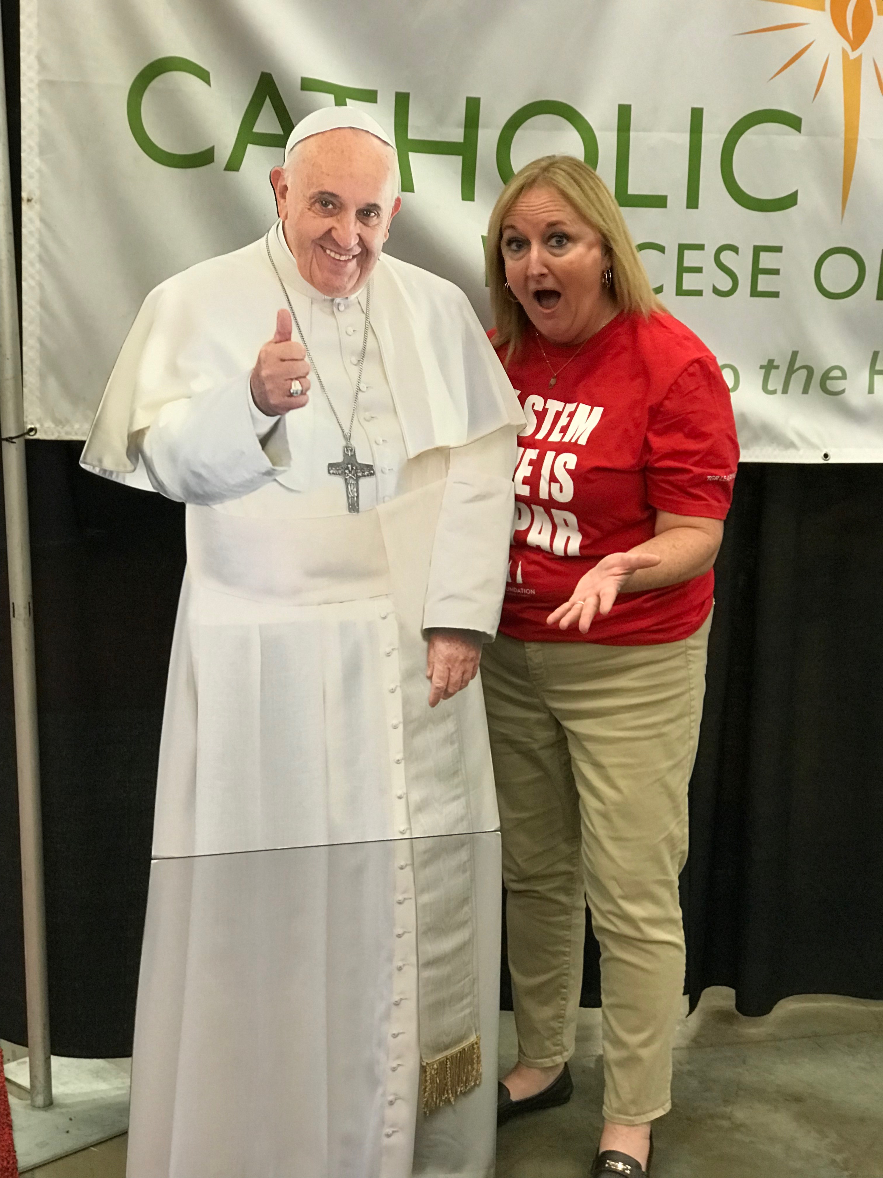 Picture with Dr. Kathy Bihr and cardboard cutout of Pope